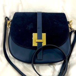 Purchased in Paris. Genuine leather.